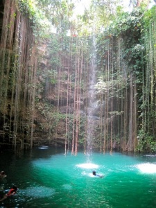 Tourists swimming in a cenote that was probably not used to murder virgins. Photo: Rita Kolankowski